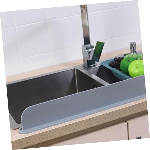 Silicone sink splash guard by fusiongadgetspk, flexible and durable kitchen accessory to prevent water splashes.