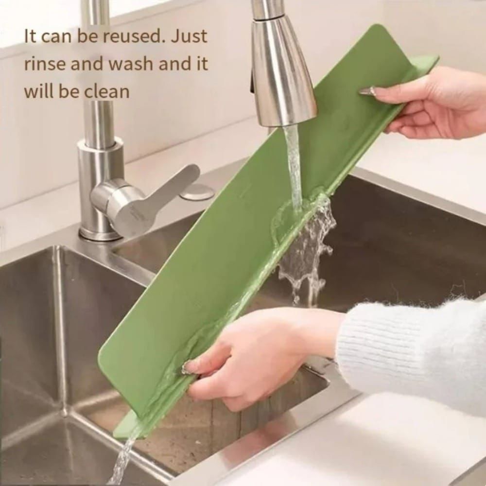 Silicone sink splash guard by fusiongadgetspk, flexible and durable, designed to prevent water splashes around kitchen sinks.