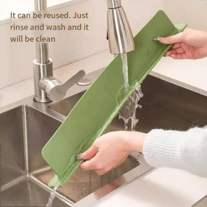 Silicone sink splash guard by fusiongadgetspk, flexible and durable, designed to prevent water splashes around kitchen sinks.